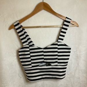 Happening in the present cropped stripped top size unknown